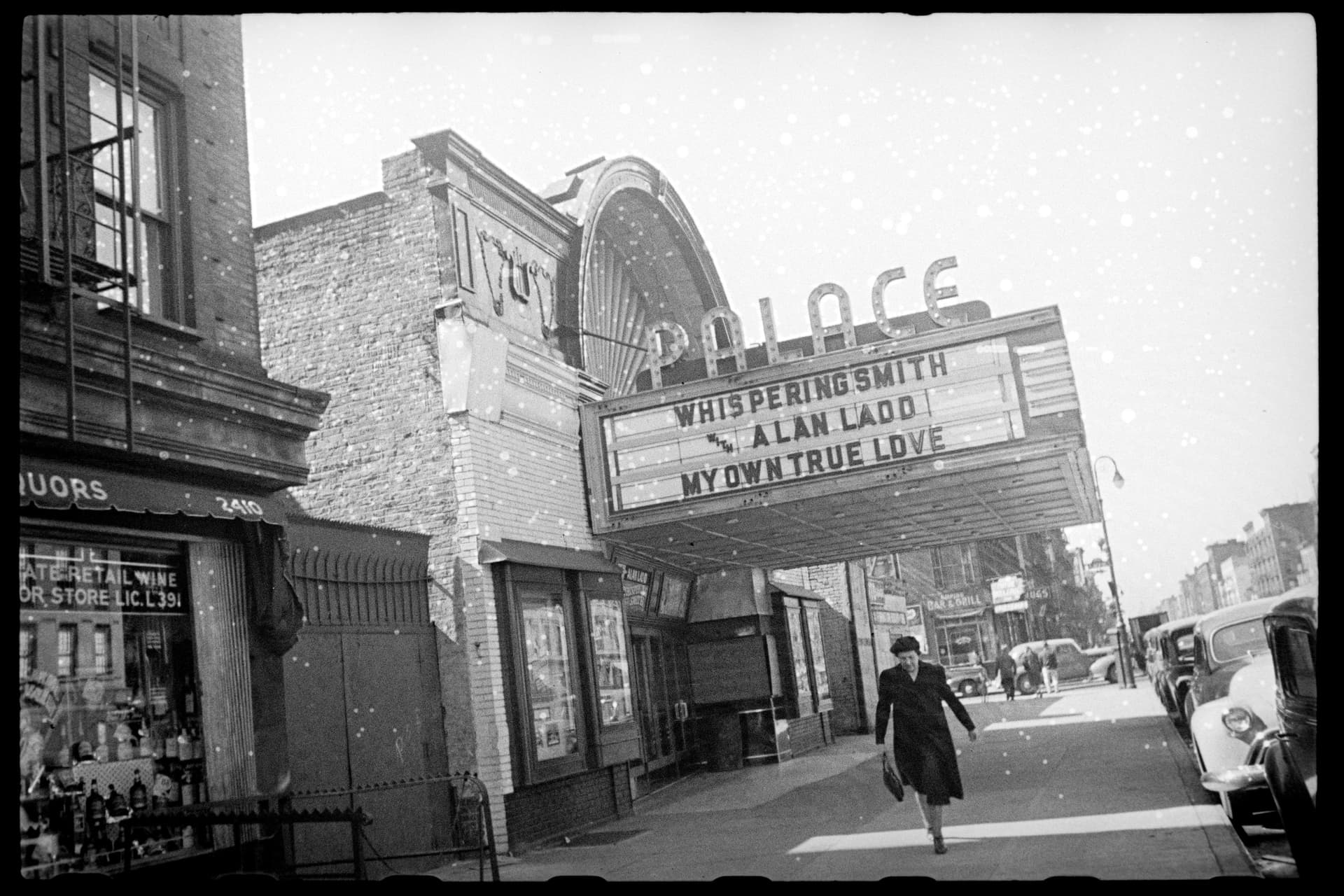 A tenement block along East Tremont Avenue in the Bronx, documented by the New York City Department of Taxation around 1940, a decade before Robert Moses routed the Cross Bronx Expressway through the same streets.